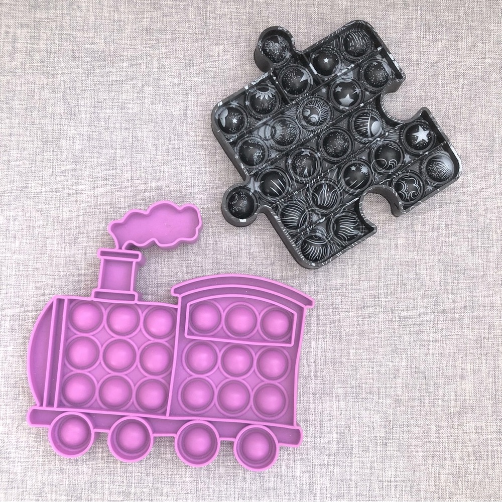 SOLD Set of 2 Silicone 5” Bubble Fidget Pop-It Toys Puzzle Piece and Train